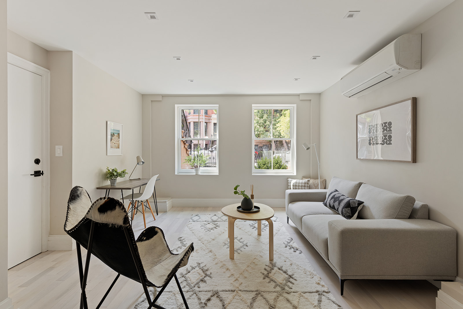 281 Jefferson Avenue Brooklyn, NY 11216 - Photo 18 of 25 a living room with furniture two window and a table