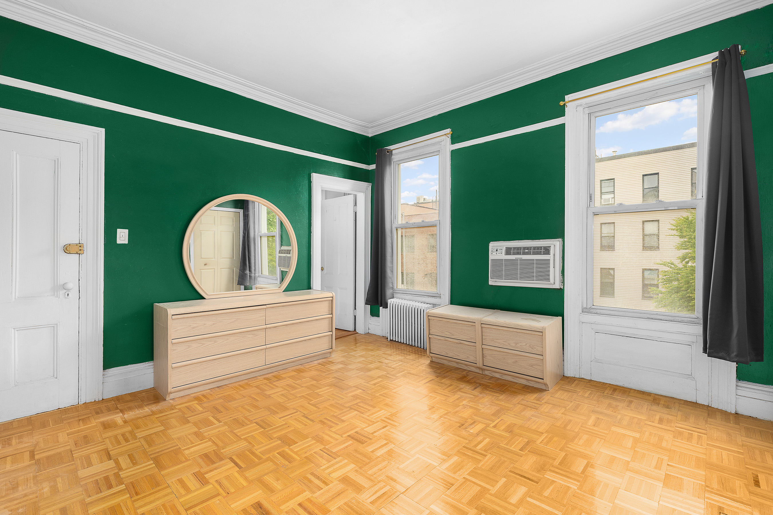 39 Broome Street Brooklyn, NY 11222 - Photo 6 of 16 a view of living room with furniture and a flat screen tv