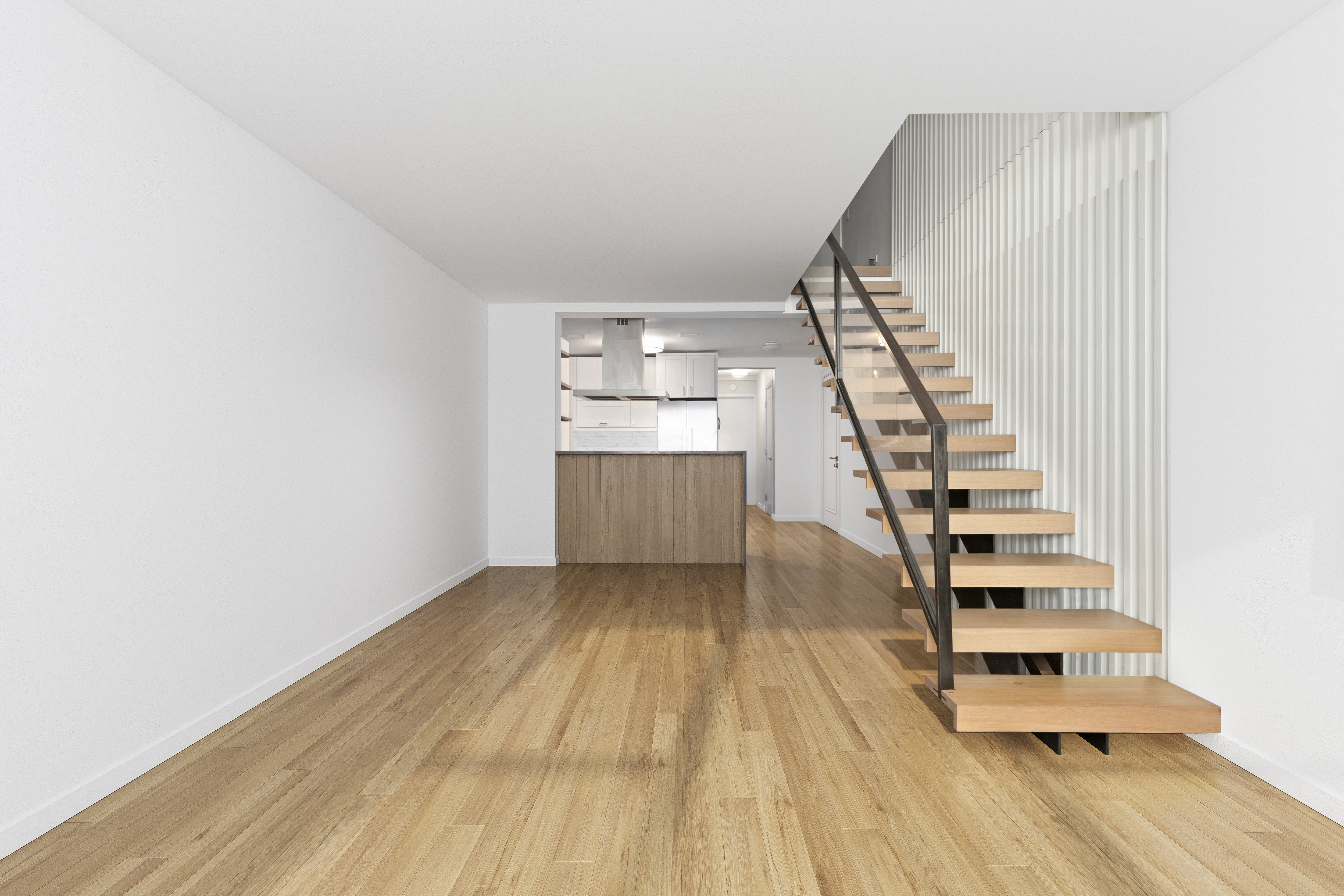 221 East 50th Street, Unit 6D/7D Manhattan, NY 10022 - Photo 4 of 19 a view of a room with wooden floor and stairs