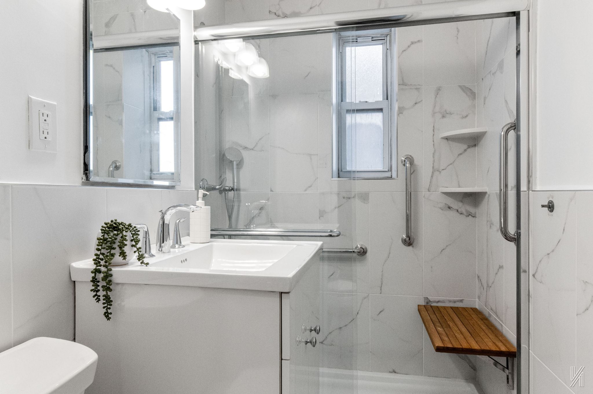 39-30 52nd Street, Unit GA Queens, NY 11377 - Photo 13 of 15 a bathroom with a sink toilet and shower