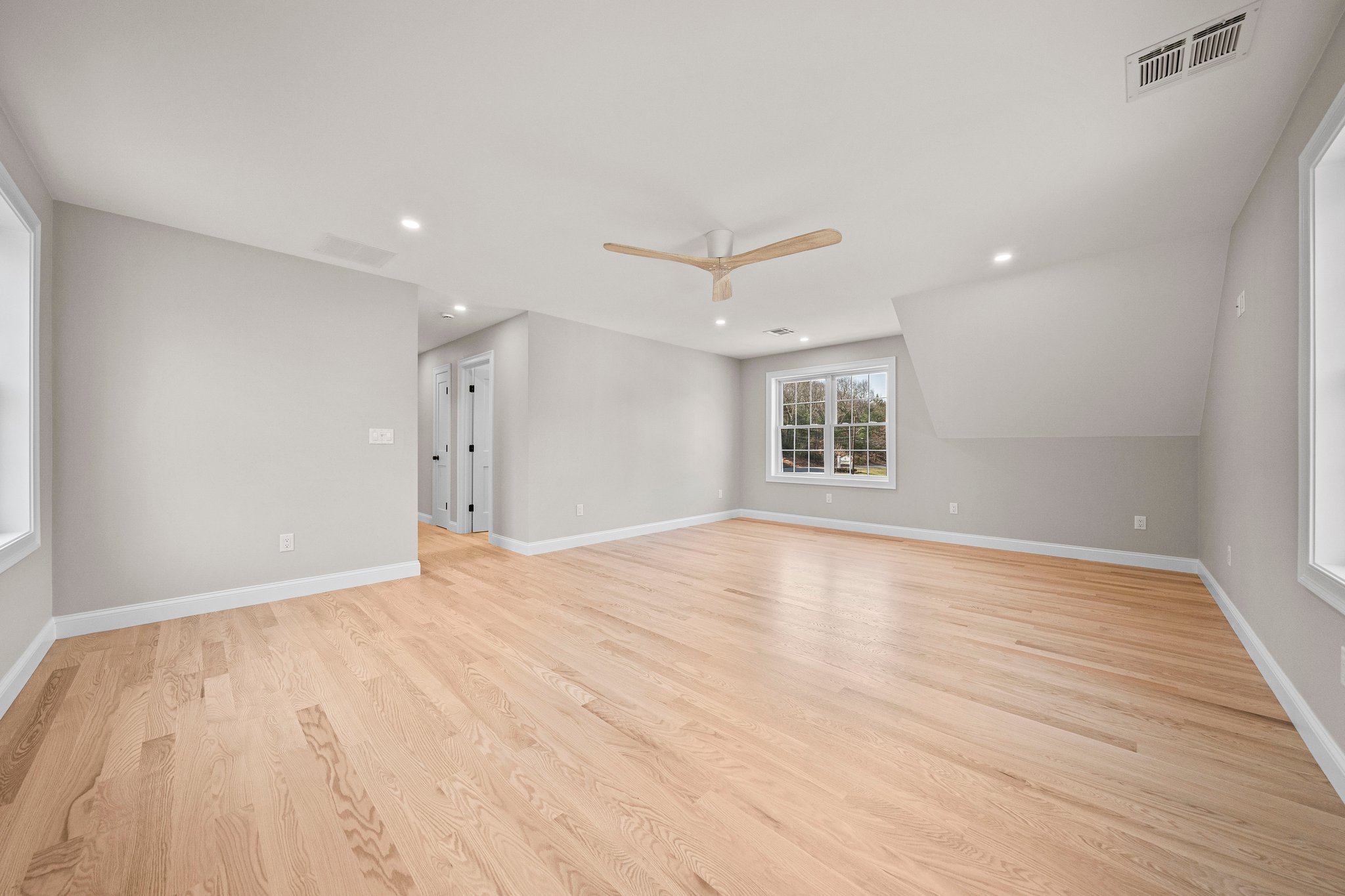 3 Everendon Road Canton, MA 02021 - Photo 19 of 35 a view of an empty room with a window and wooden floor