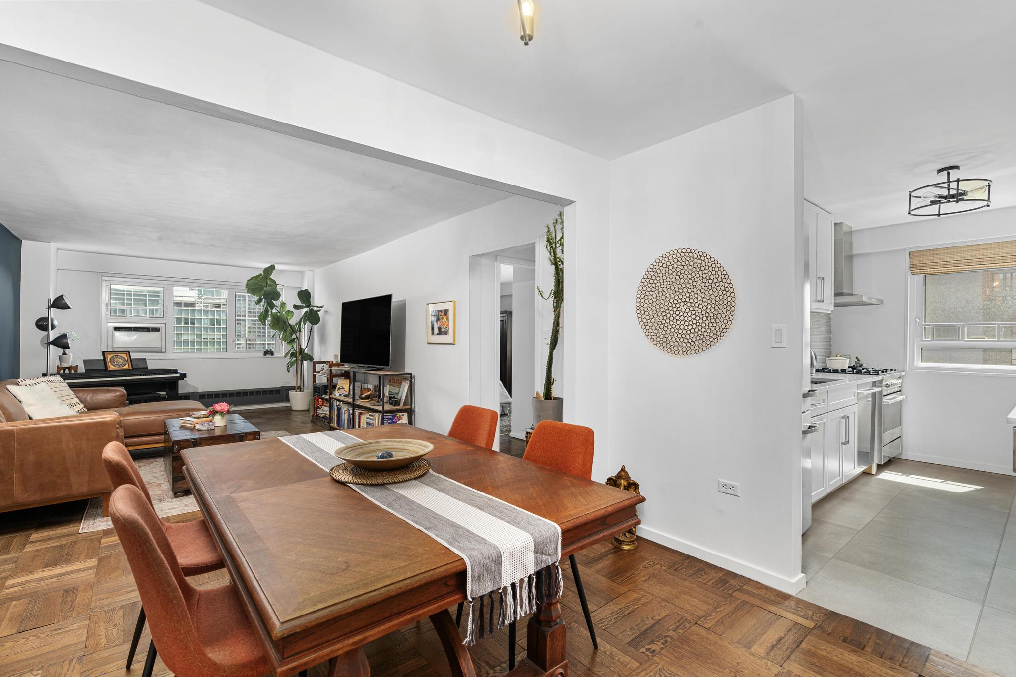 230 Jay Street, Unit 10H Brooklyn, NY 11201 - Photo 4 of 13 a view of a dining room with furniture and a livingroom