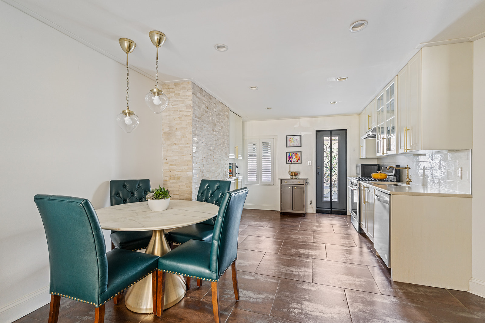 231 Vernon Avenue Brooklyn, NY 11206 - Photo 2 of 13 a view of a dining room with furniture and wooden floor