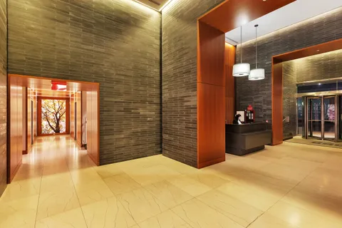 a gym room with lots of gym equipment