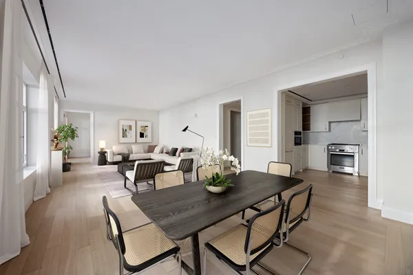 a dining room with furniture and wooden floor