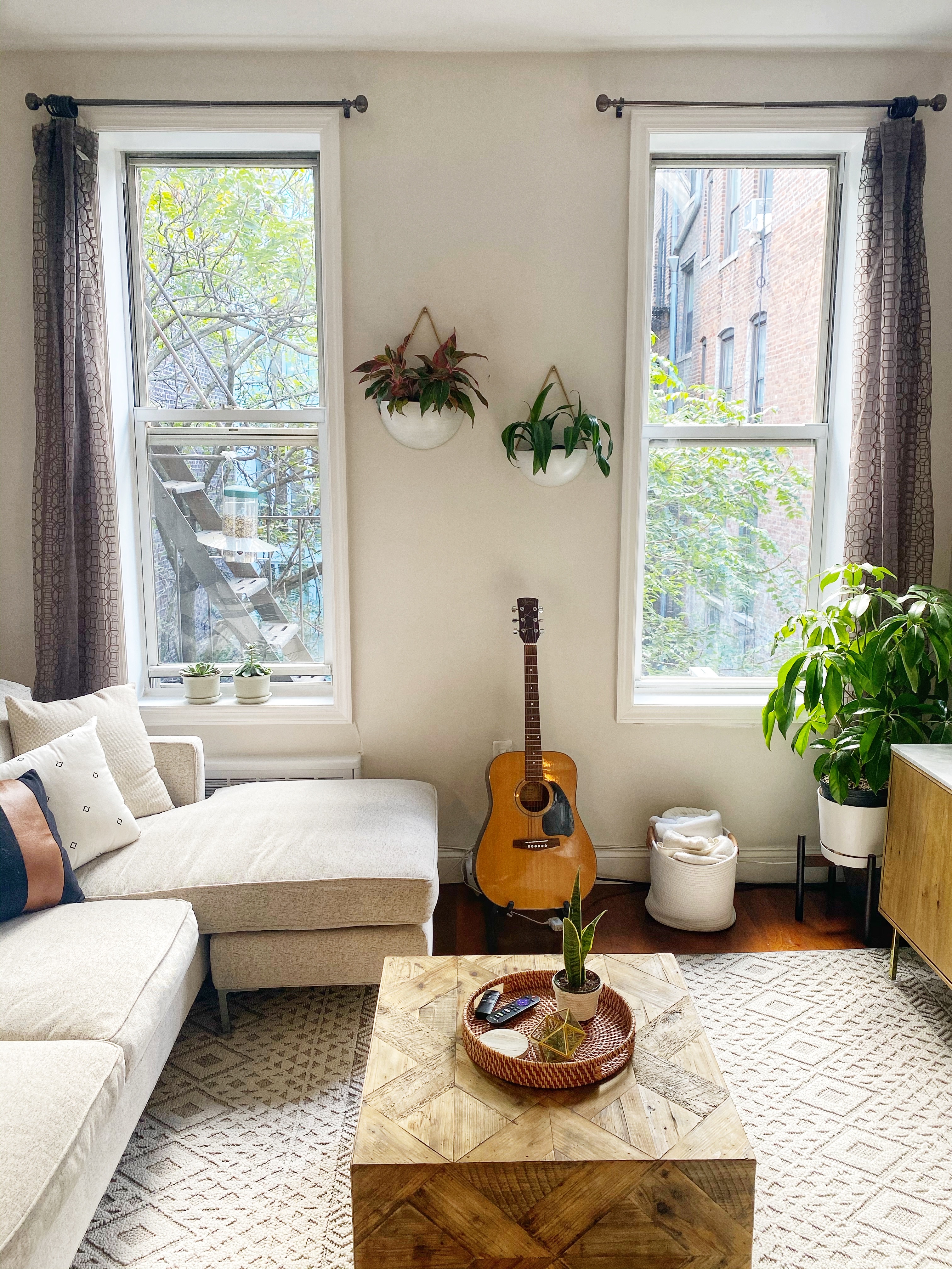 406 West 46th Street, Unit 4C Manhattan, NY 10036 - Photo 2 of 9 a living room with furniture and window