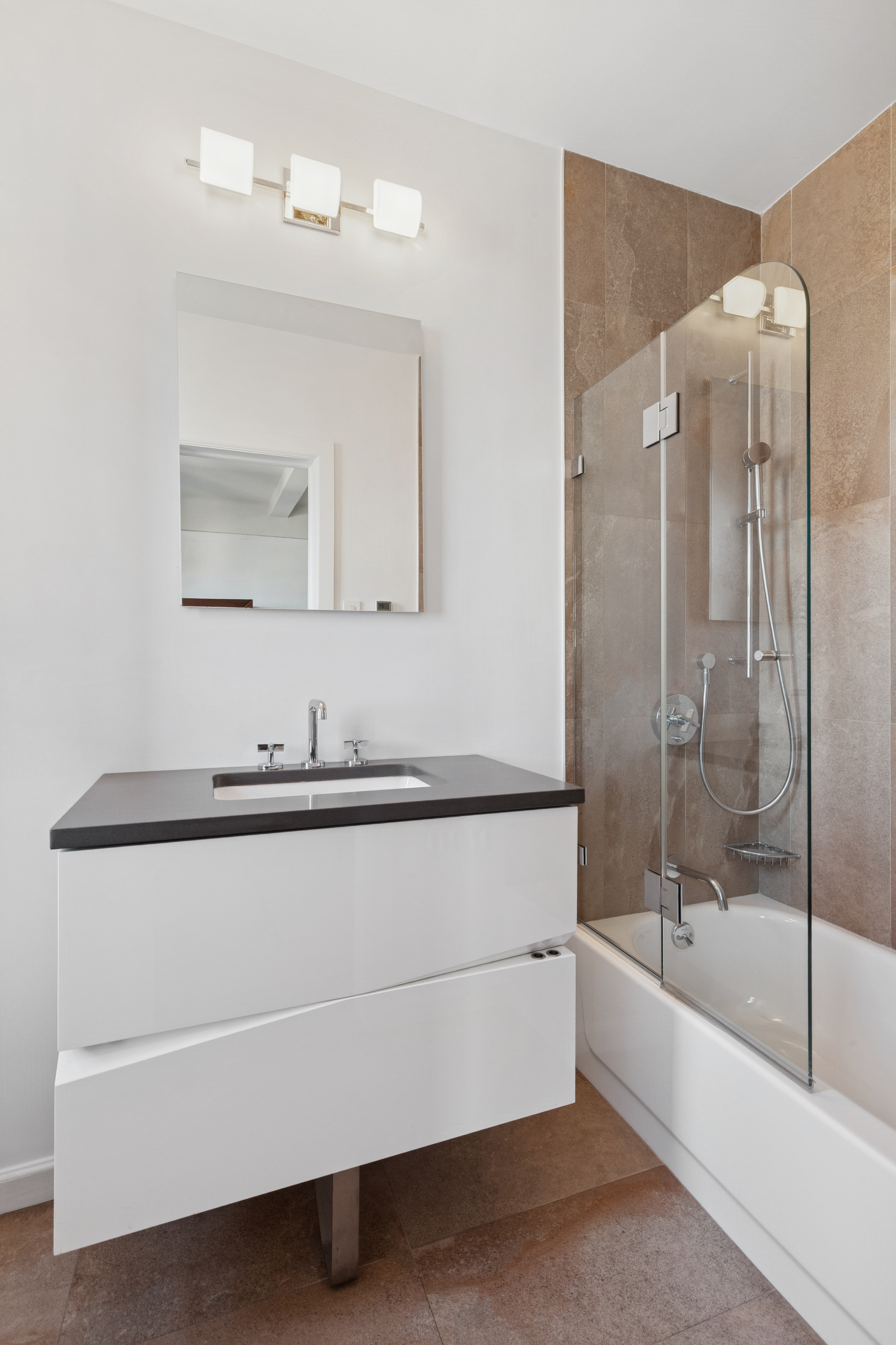 710 West End Avenue, Unit 14B Manhattan, NY 10025 - Photo 12 of 19 a bathroom with a bathtub and a sink