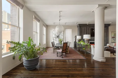 a view of a living room and dining room
