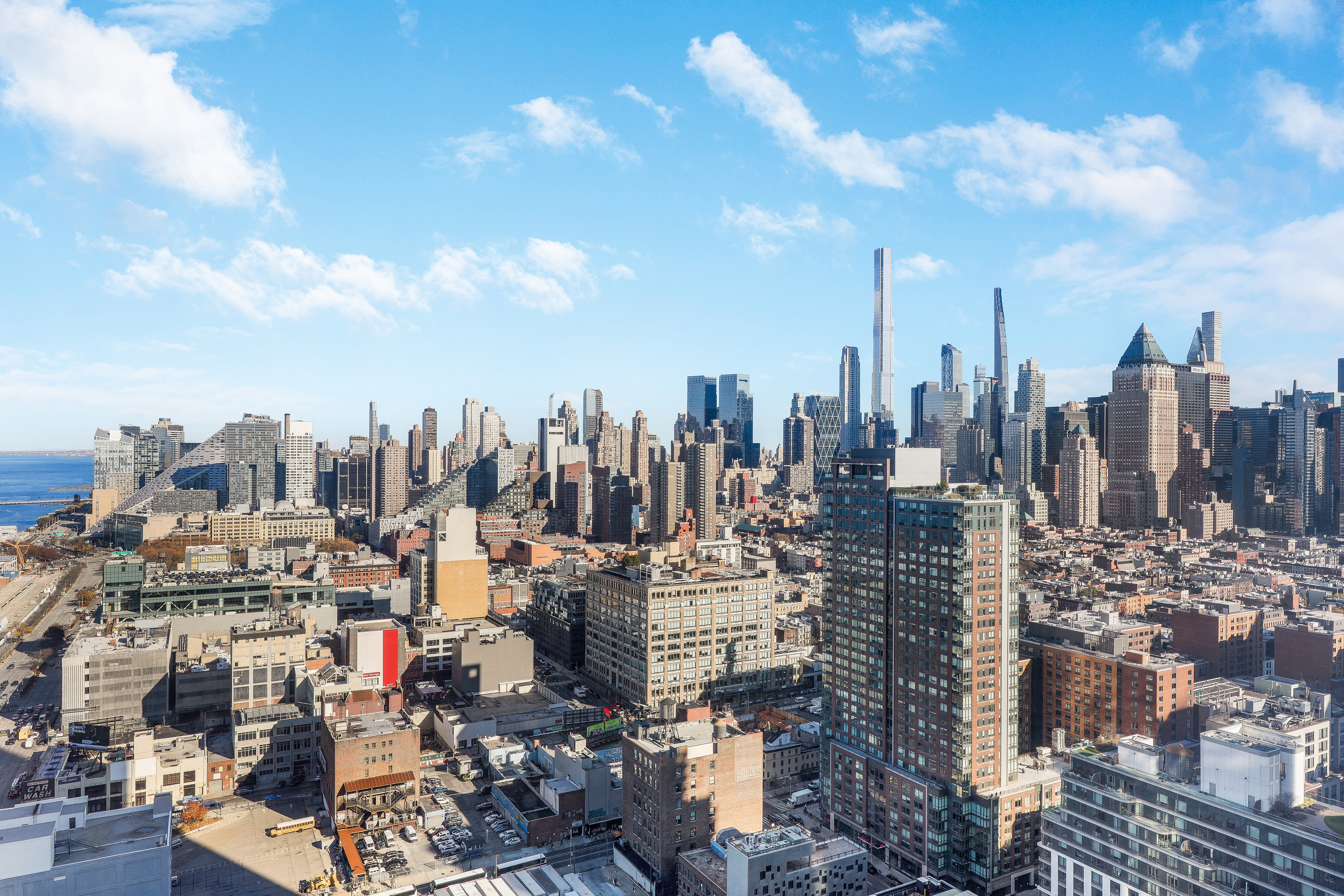 635 West 42nd Street, Unit 34B Manhattan, NY 10036 - Photo 8 of 10 a view of a city with tall buildings