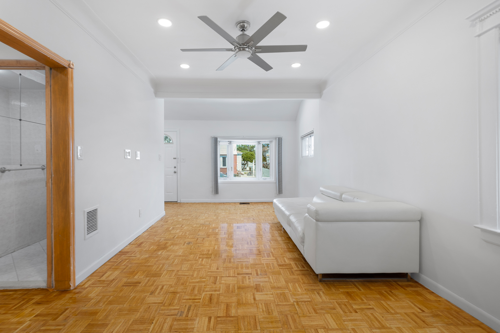 91-22 92nd Street Queens, NY 11421 - Photo 14 of 27 a view of an empty room and window