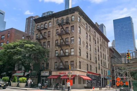 a view of a building with a street