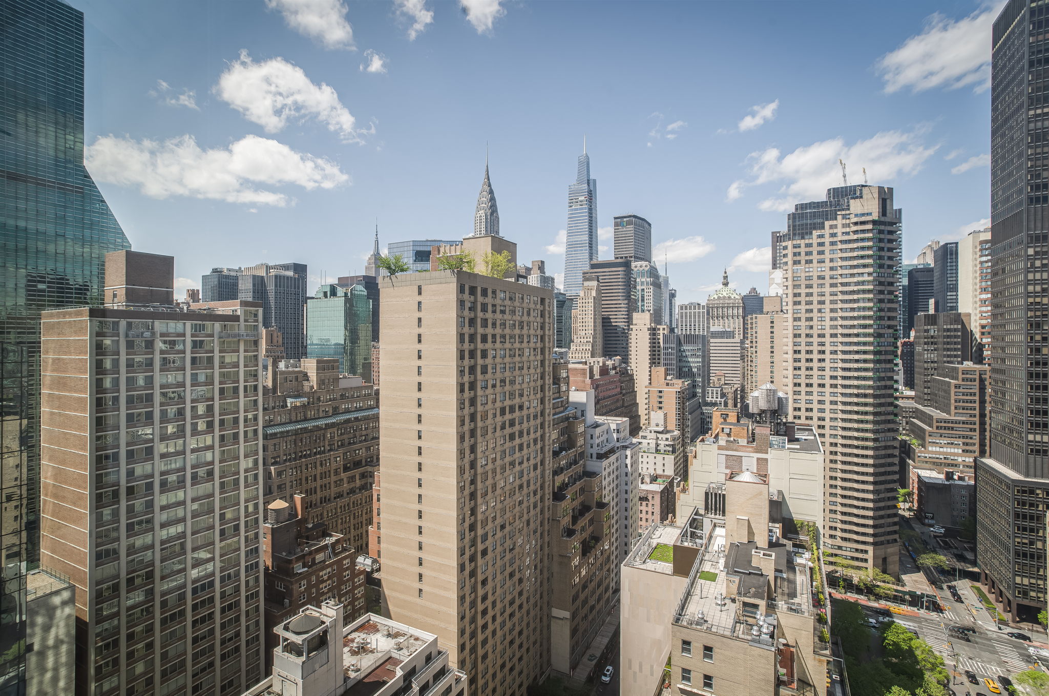 50 United Nations Plaza, Unit 26B Manhattan, NY 10017 - Photo 23 of 25 a view of a city with tall buildings