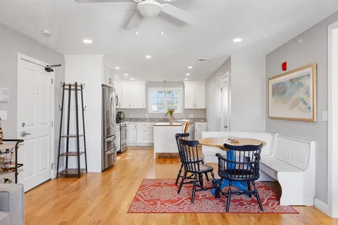 a view of a dining room with furniture