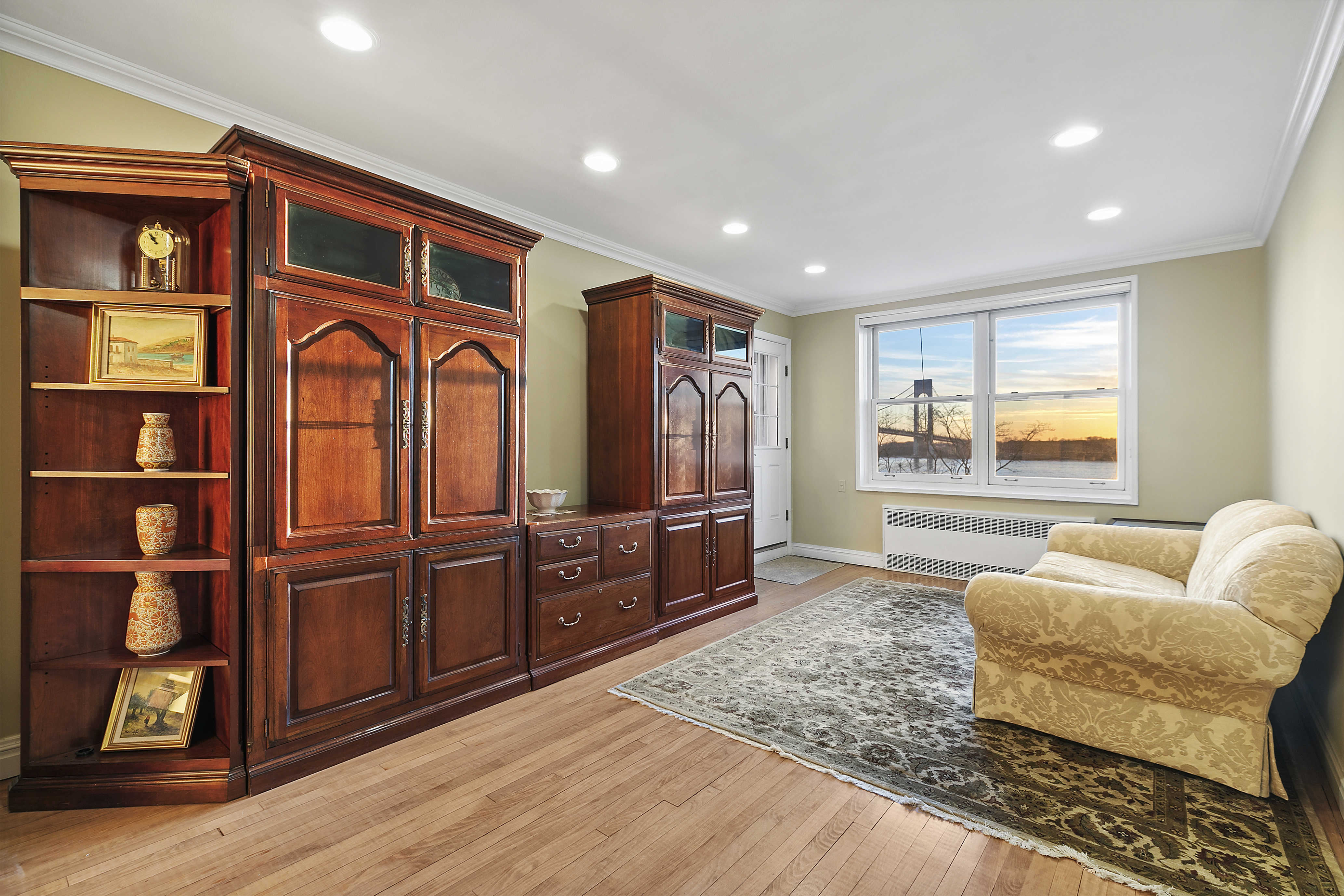 9801 Shore Road, Unit 5A Brooklyn, NY 11209 - Photo 1 of 11 a living room with furniture and wooden floor