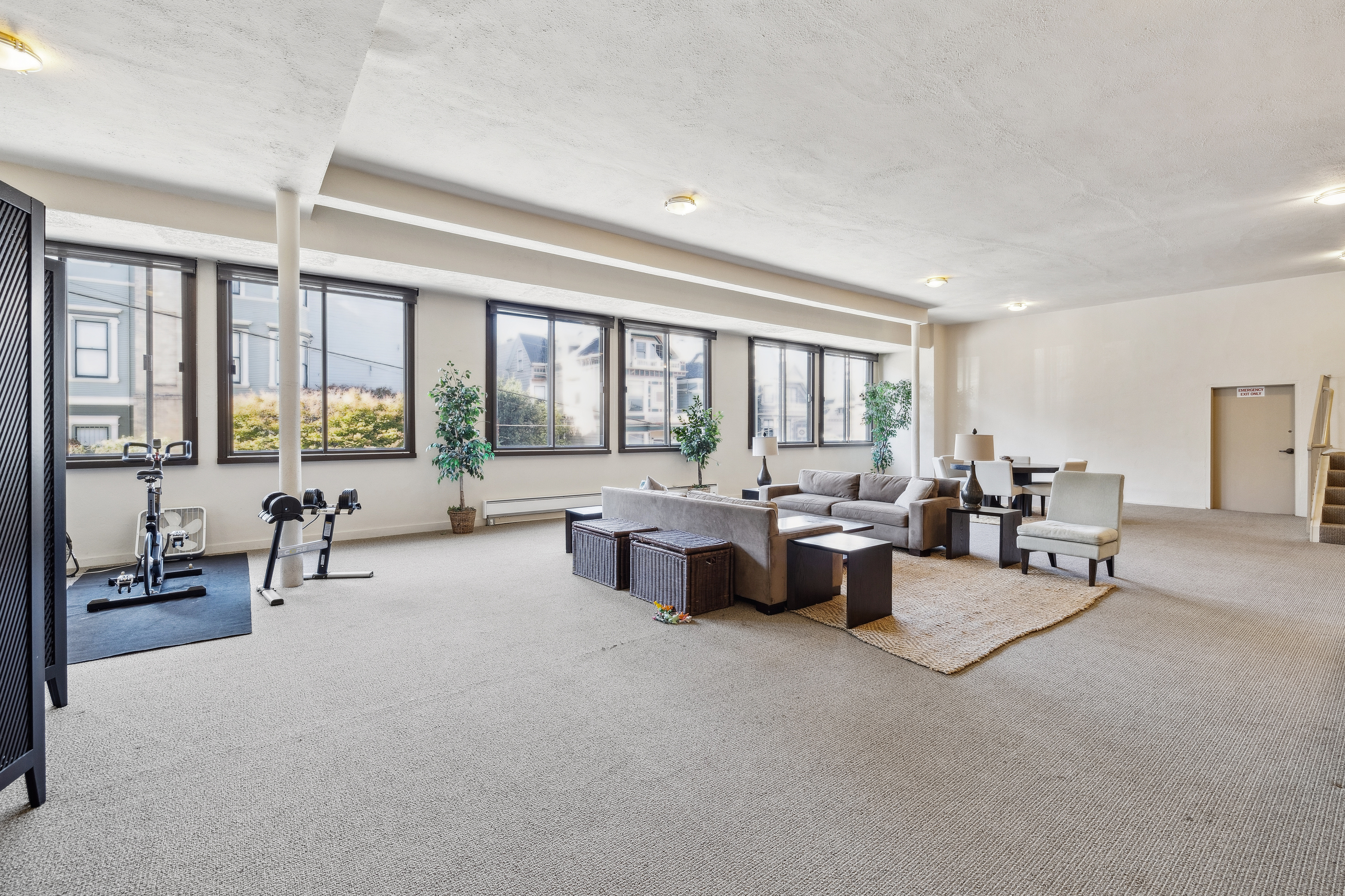 1998 Pacific Avenue San Francisco, CA 94109 - Photo 24 of 28 a living room with furniture and large windows