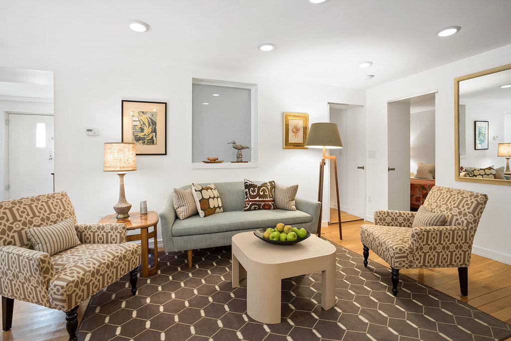 315 Washington Avenue Brooklyn, NY 11205 - Photo 34 of 38 a living room with furniture and a couch