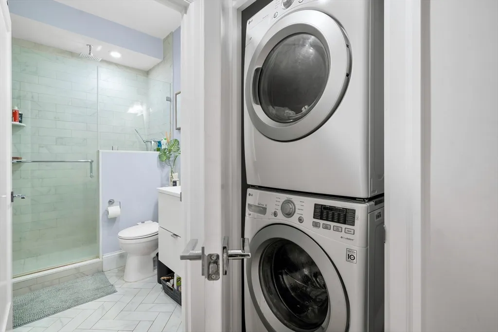 a view of a bathroom with a toilet and a sink