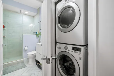 a view of a bathroom with a toilet and a sink