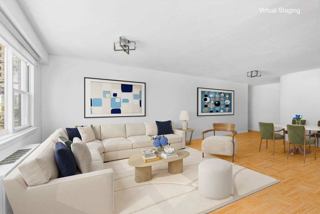 101 West 12th Street, Unit 5V Manhattan, NY 10011 - Photo 3 of 26 a living room with furniture kitchen view and a window
