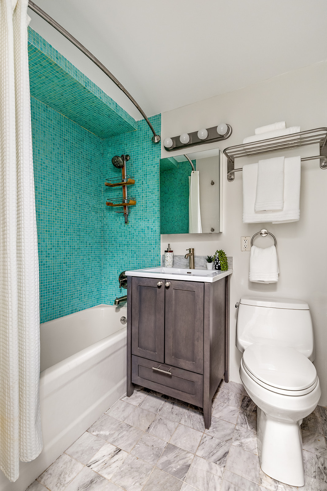 101 Lafayette Avenue, Unit 6D Brooklyn, NY 11217 - Photo 7 of 9 a bathroom with a sink a toilet and bathtub