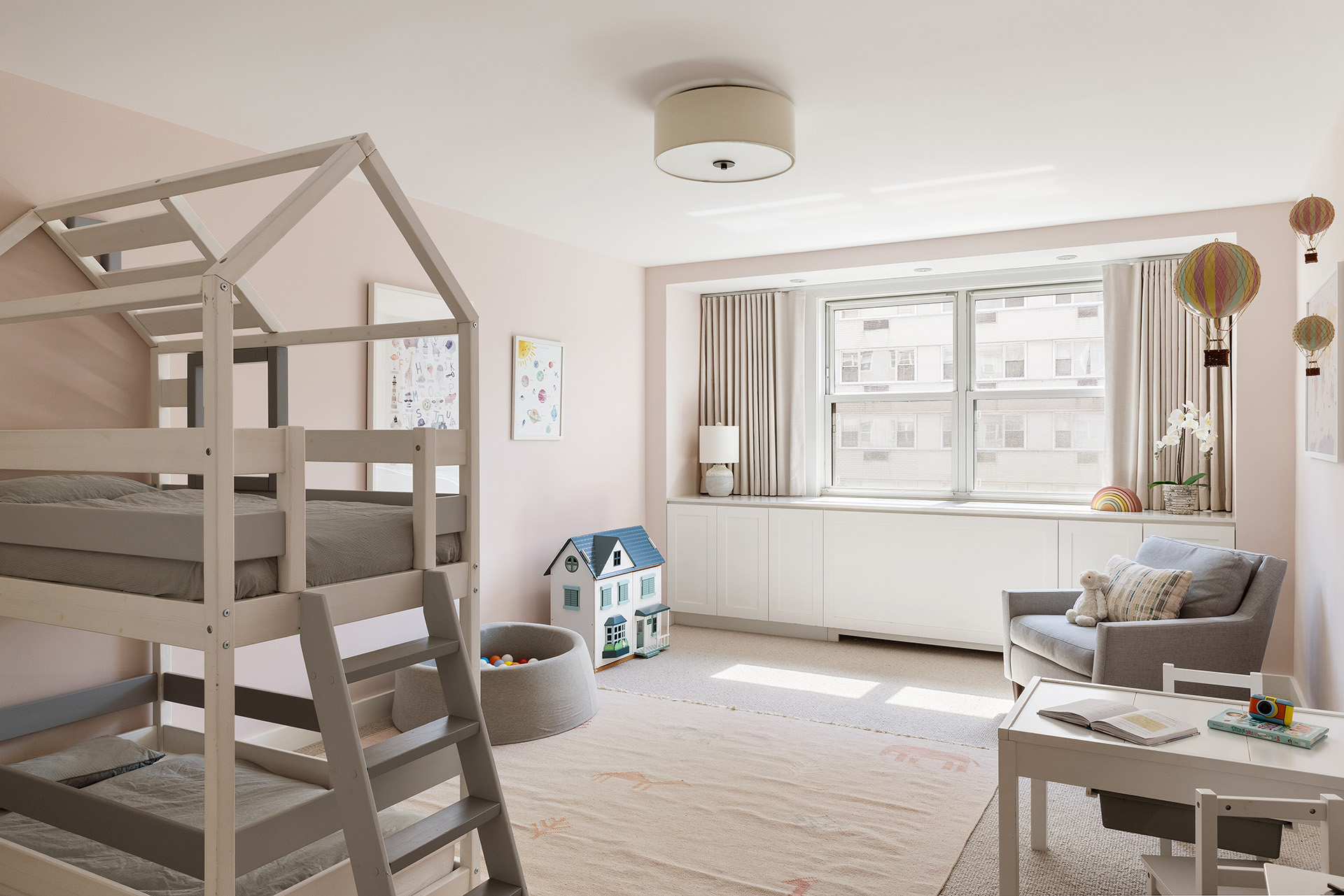 101 West 12th Street, Unit 8RS Manhattan, NY 10011 - Photo 14 of 19 a living room with furniture and a window
