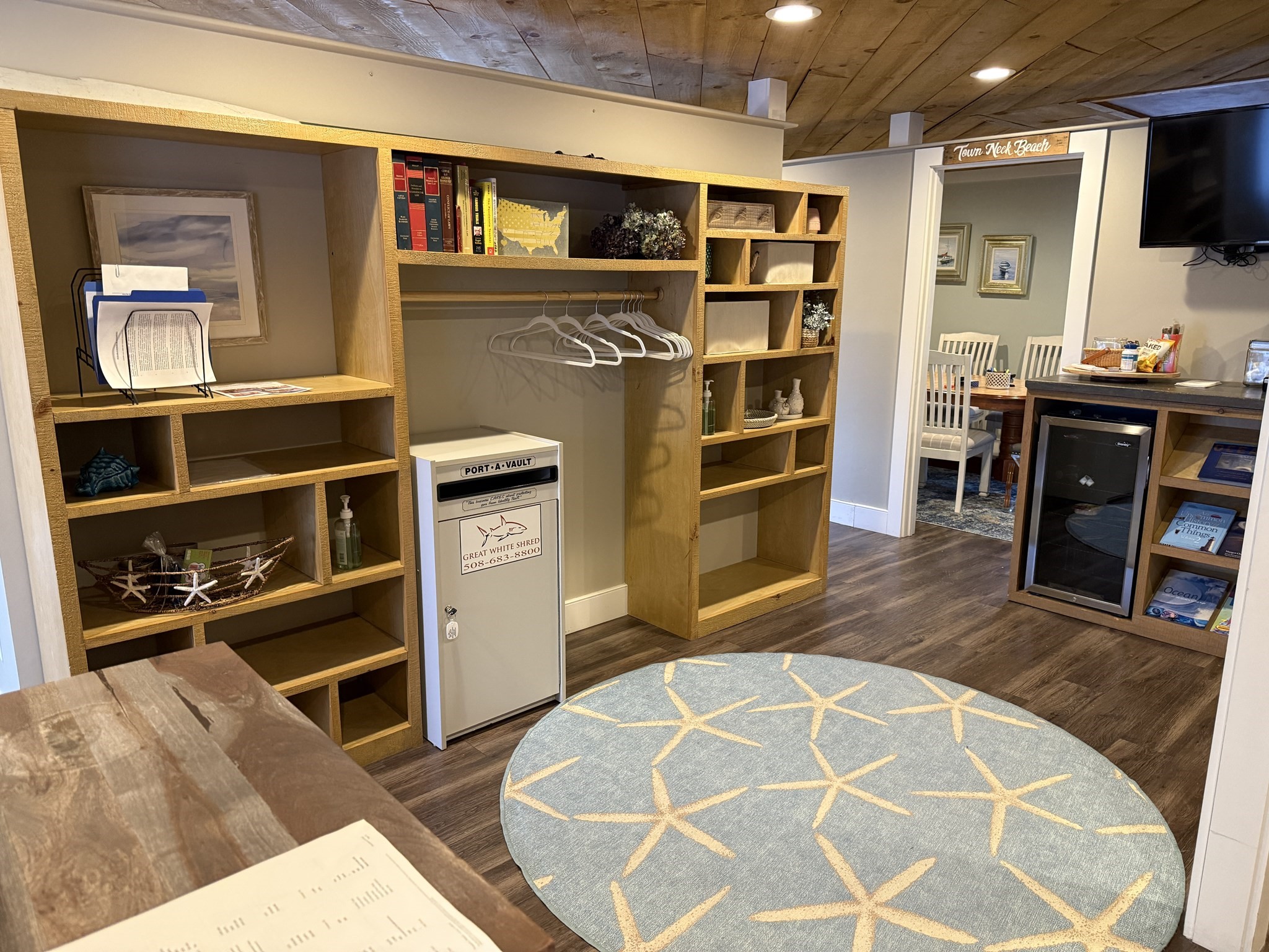 68 Tupper Road, Unit 8 Sandwich, MA 02563 - Photo 6 of 9 a living room with stainless steel appliances kitchen island granite countertop a refrigerator a stove and a dining table with wooden floor