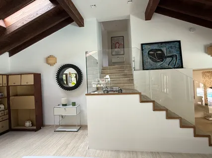 a hallway with wooden floor