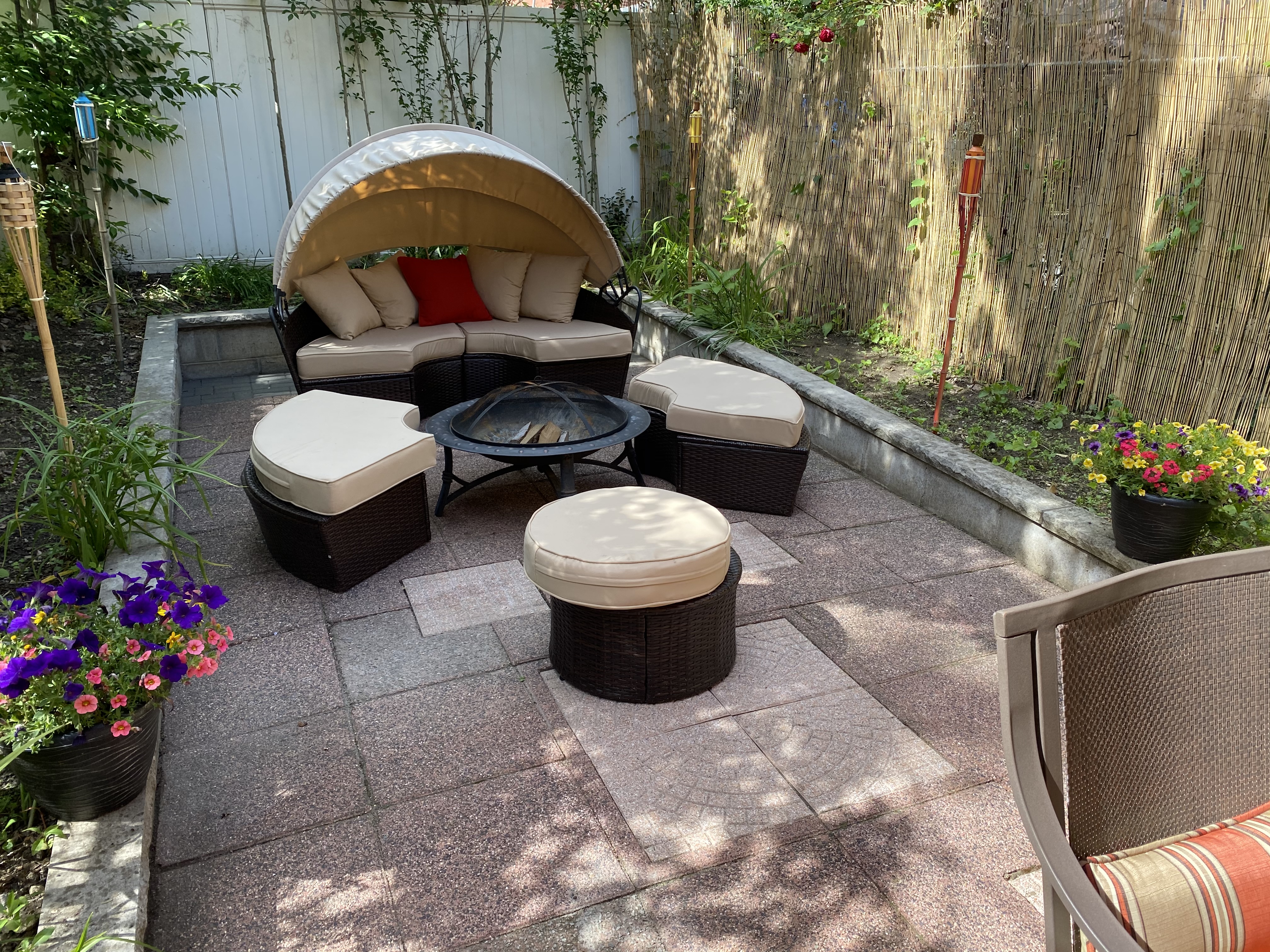 493 Decatur Street, Unit 1 Brooklyn, NY 11233 - Photo 23 of 26 a view of a backyard with fountain plants and swimming pool