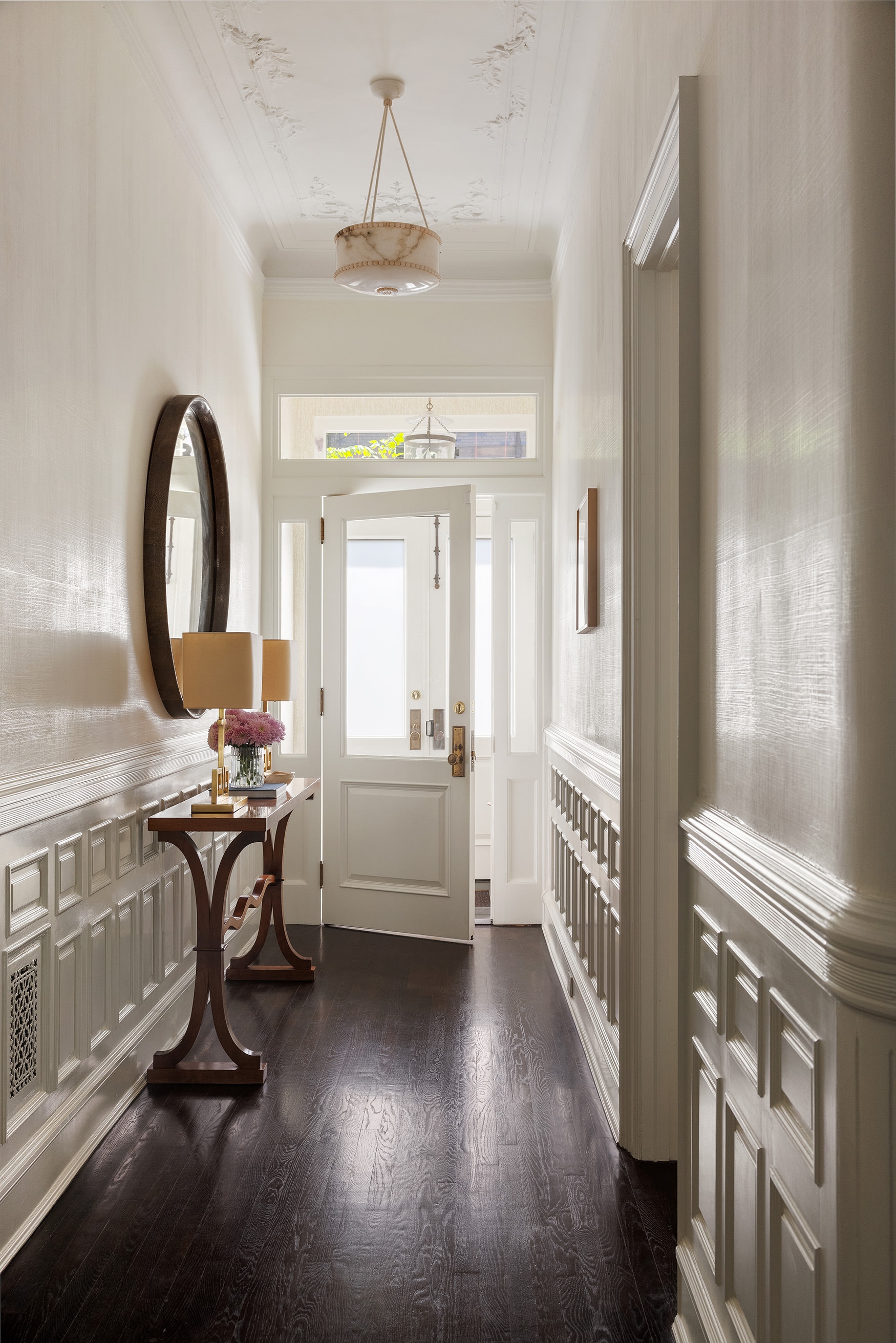 135 West 77th Street Manhattan, NY 10024 - Photo 31 of 32 a view of a livingroom with furniture and a window