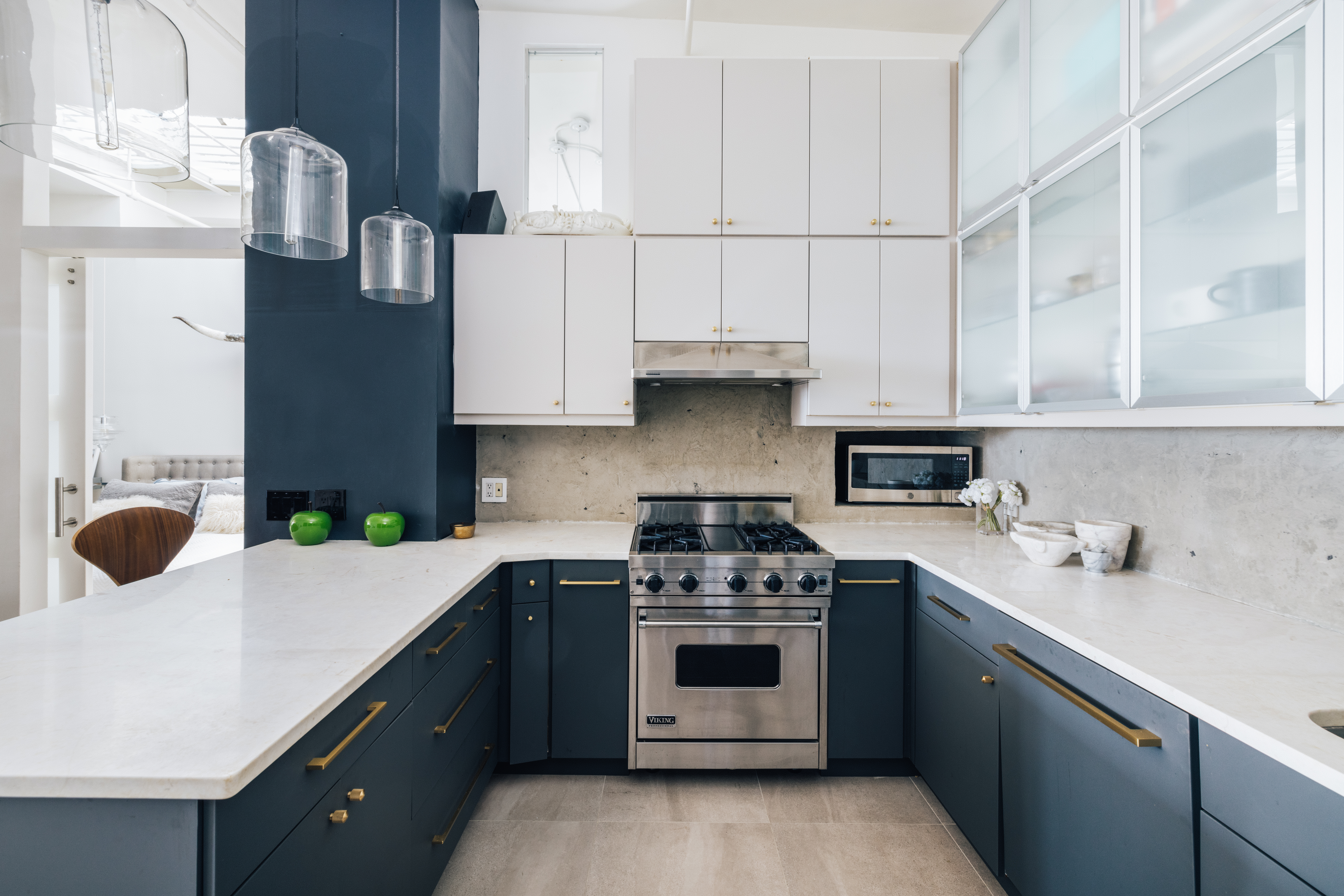 718 Broadway, Unit PHC Manhattan, NY 10003 - Photo 11 of 21 a kitchen with stainless steel appliances a sink stove and cabinets