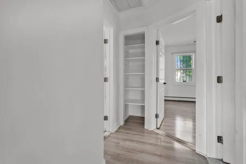 wooden floor and closet in a gallery
