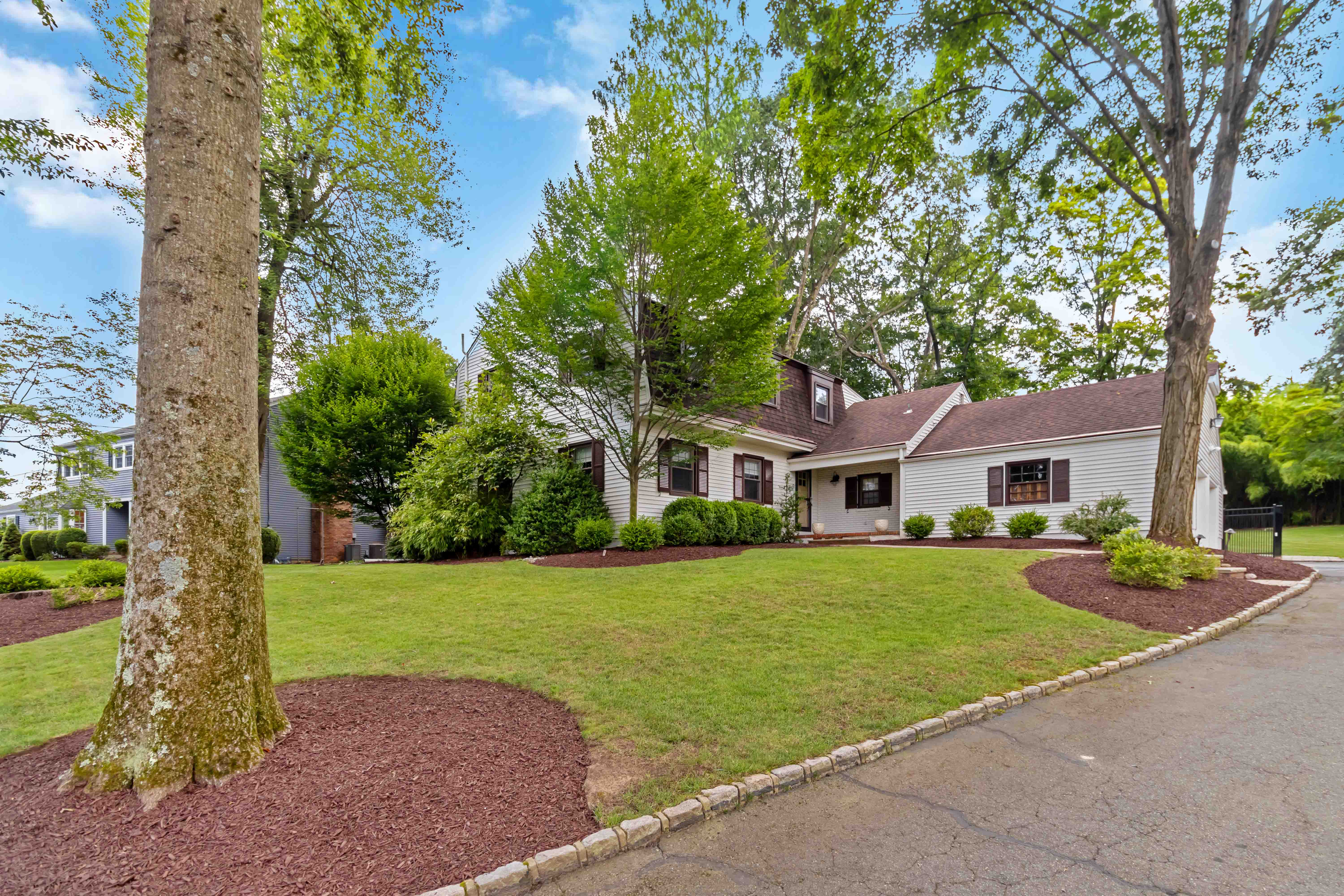 34 Colonial Drive Morristown, NJ 07960 - Photo 5 of 41 a view of a house with a yard
