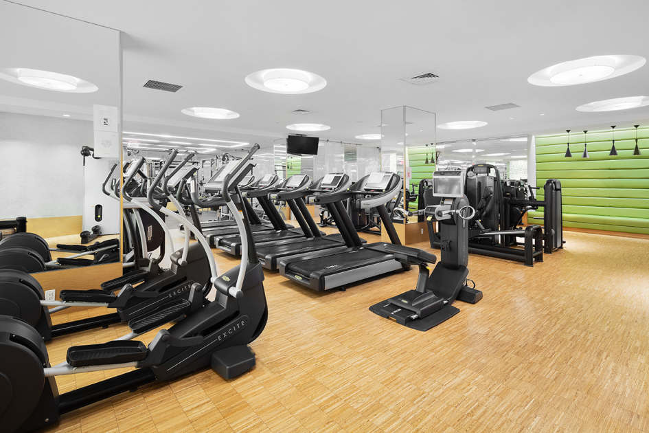 200 East 94th Street, Unit 1516 Manhattan, NY 10128 - Photo 9 of 14 a view of a room with gym equipment