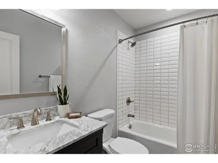 a swimming pool with outdoor seating and yard