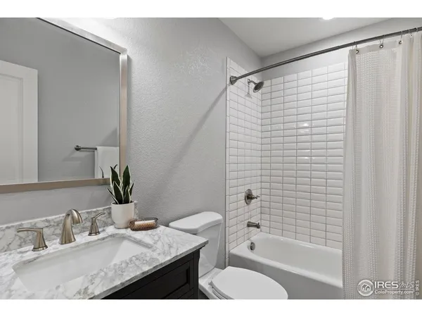 a swimming pool with outdoor seating and yard