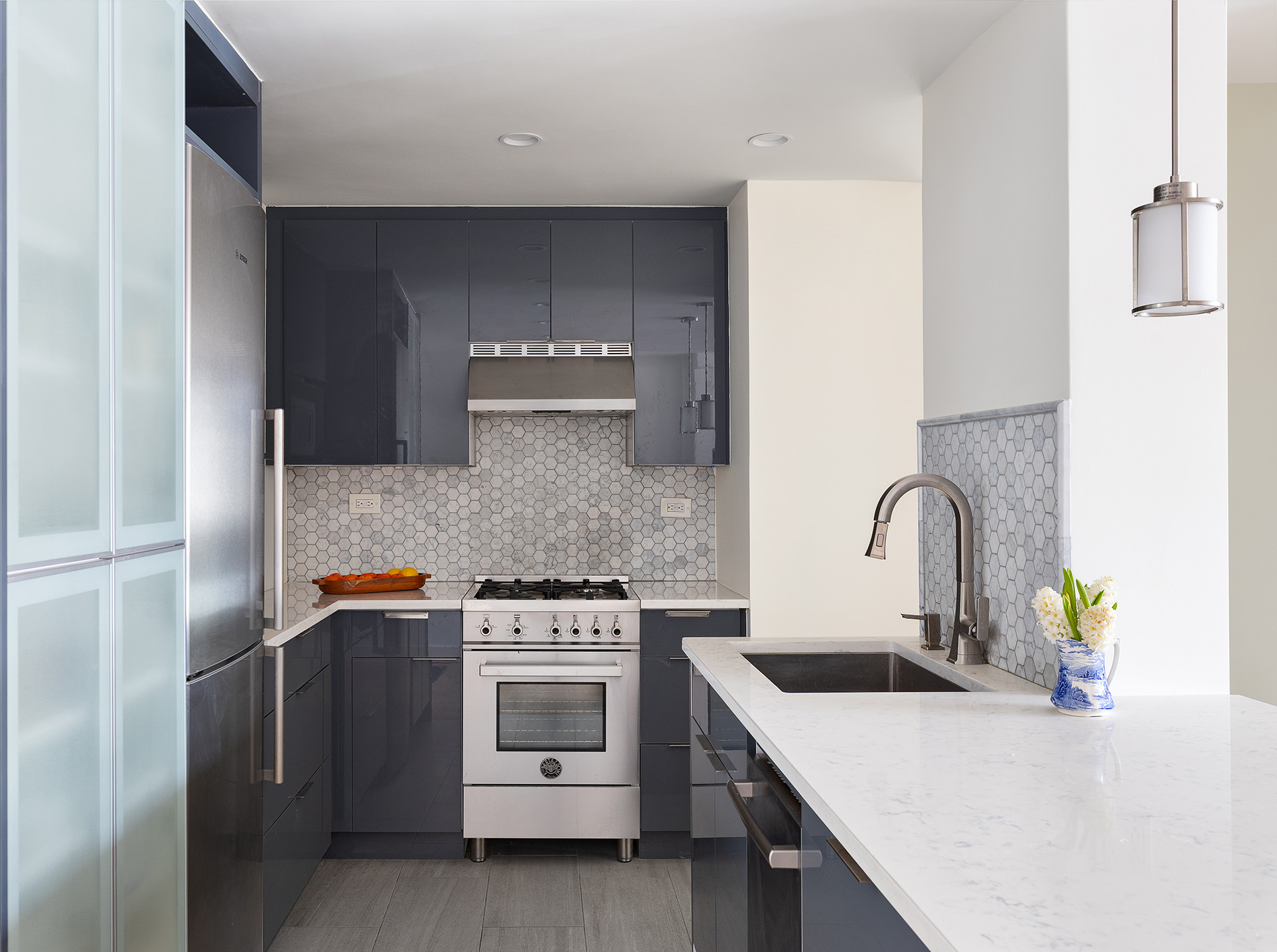 7 East 14th Street, Unit 18X Manhattan, NY 10003 - Photo 4 of 7 a kitchen with a sink and a stove top oven