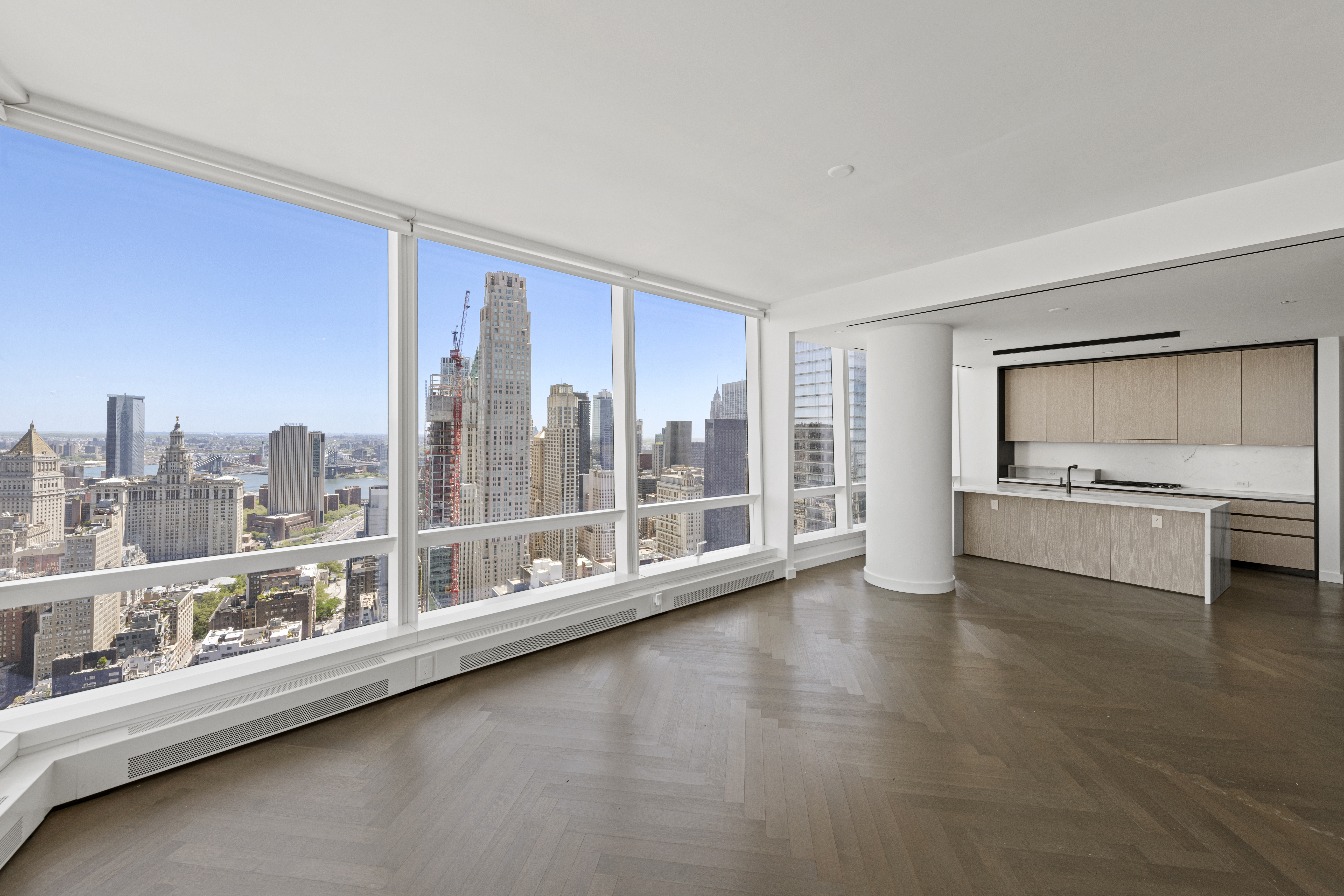 111 Murray Street, Unit 51EAST Manhattan, NY 10007 - Photo 9 of 42 a view of a kitchen with a sink and dishwasher cabinets