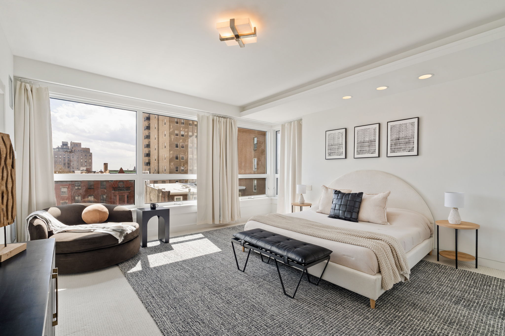 1820 Rittenhouse Square, Unit 601 Philadelphia, PA 19103 - Photo 3 of 4 a bedroom with a bed and a large window