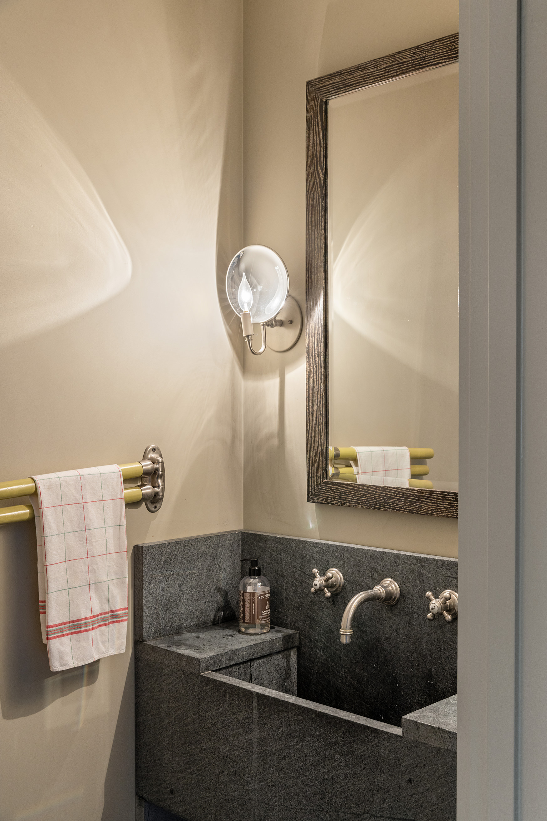 25 Perry Street Manhattan, NY 10014 - Photo 20 of 32 a bathroom with a sink and a mirror