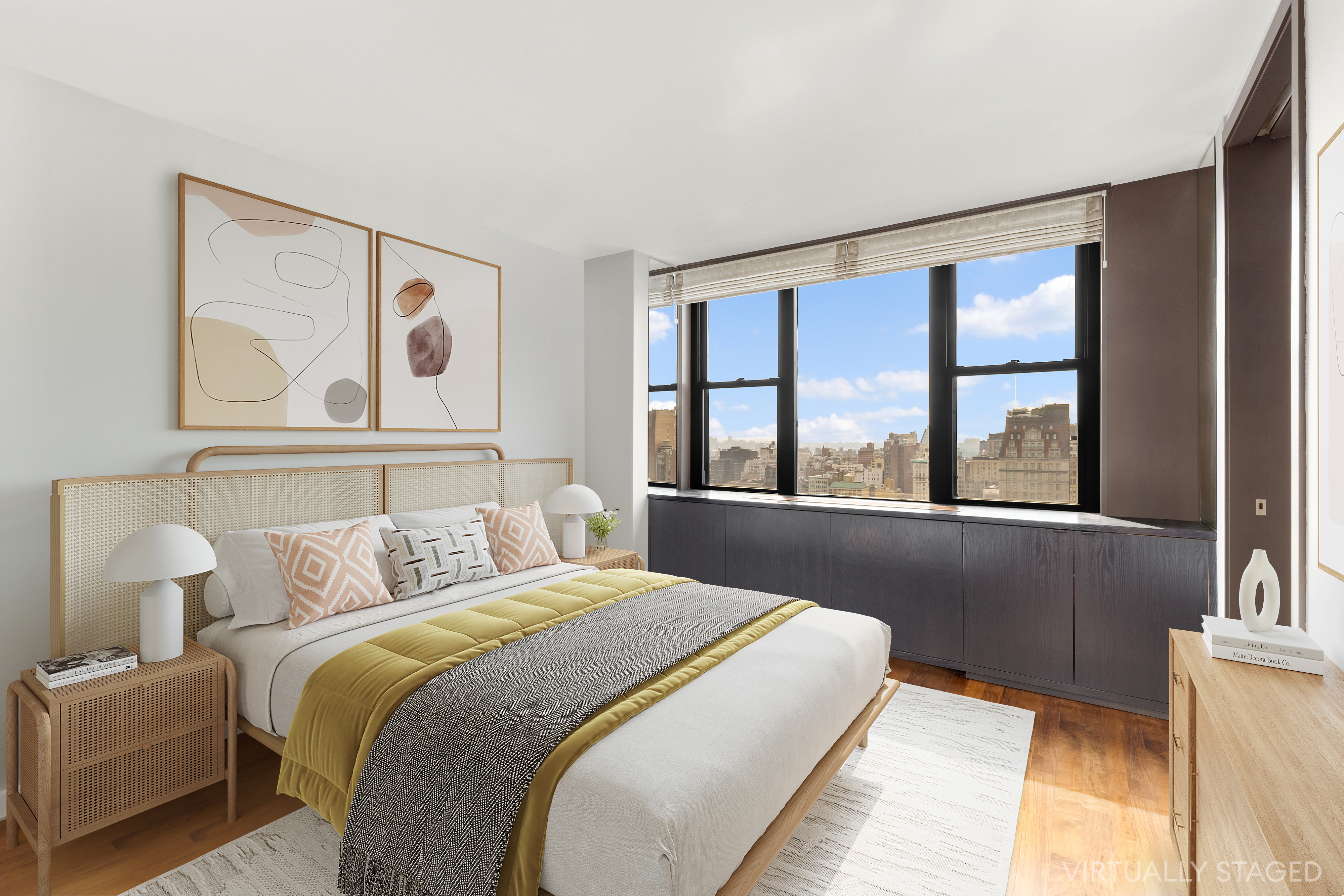201 East 17th Street, Unit 31E Manhattan, NY 10003 - Photo 4 of 15 a bedroom with a large bed and a large window