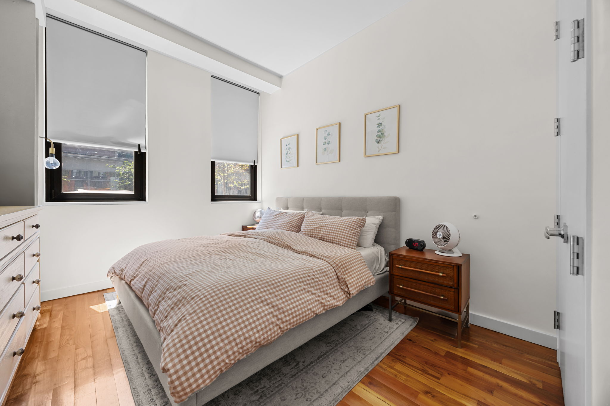 161 North 4th Street, Unit 1C Brooklyn, NY 11211 - Photo 3 of 10 a bedroom with a bed and painting on the wall