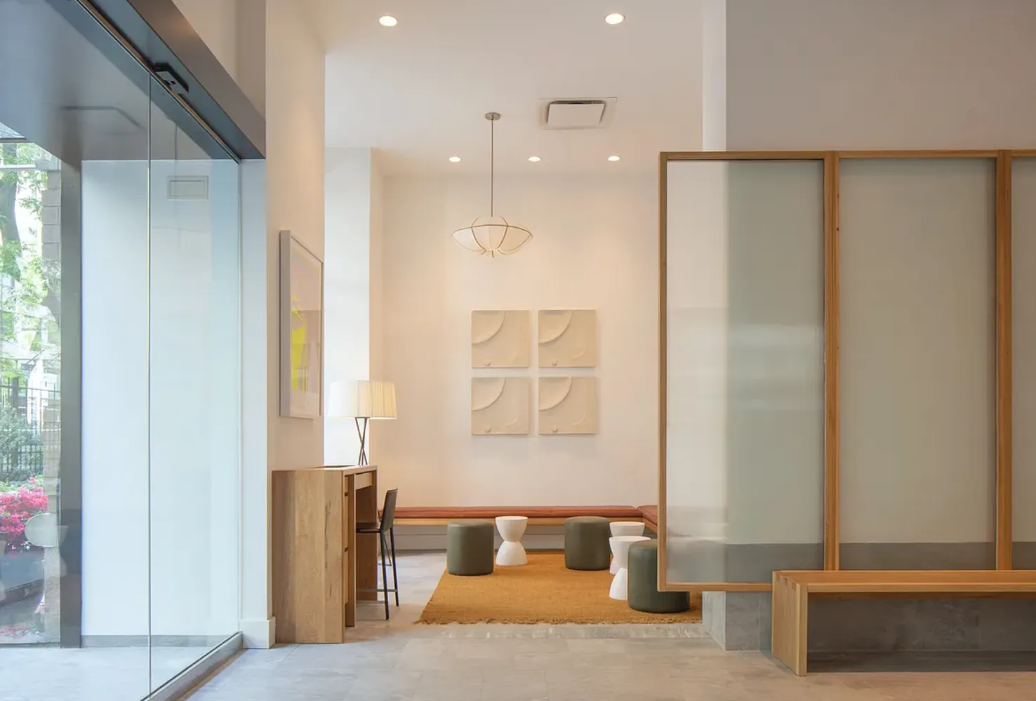 a bathroom with a shower and a mirror