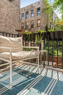 a building outdoor space with lots of trees in the background