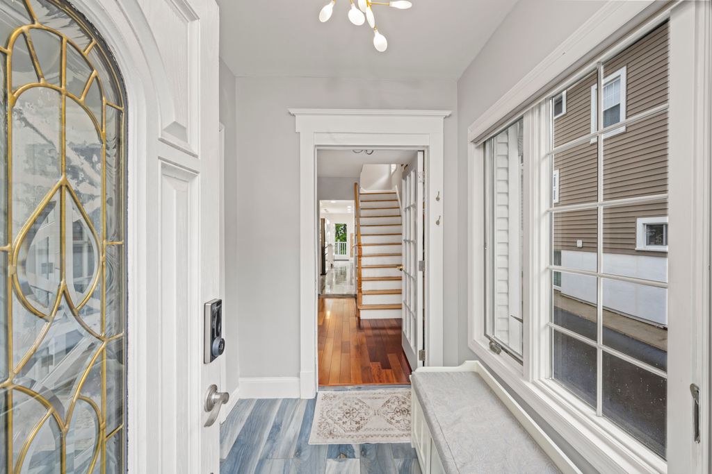 79 Sparkill Avenue Staten Island, NY 10304 - Photo 4 of 32 a view of a hallway with wooden floor and entryway