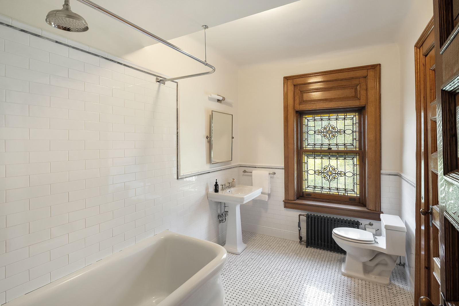18 Prospect Park West Brooklyn, NY 11215 - Photo 23 of 33 a bathroom with a granite countertop sink a toilet and shower