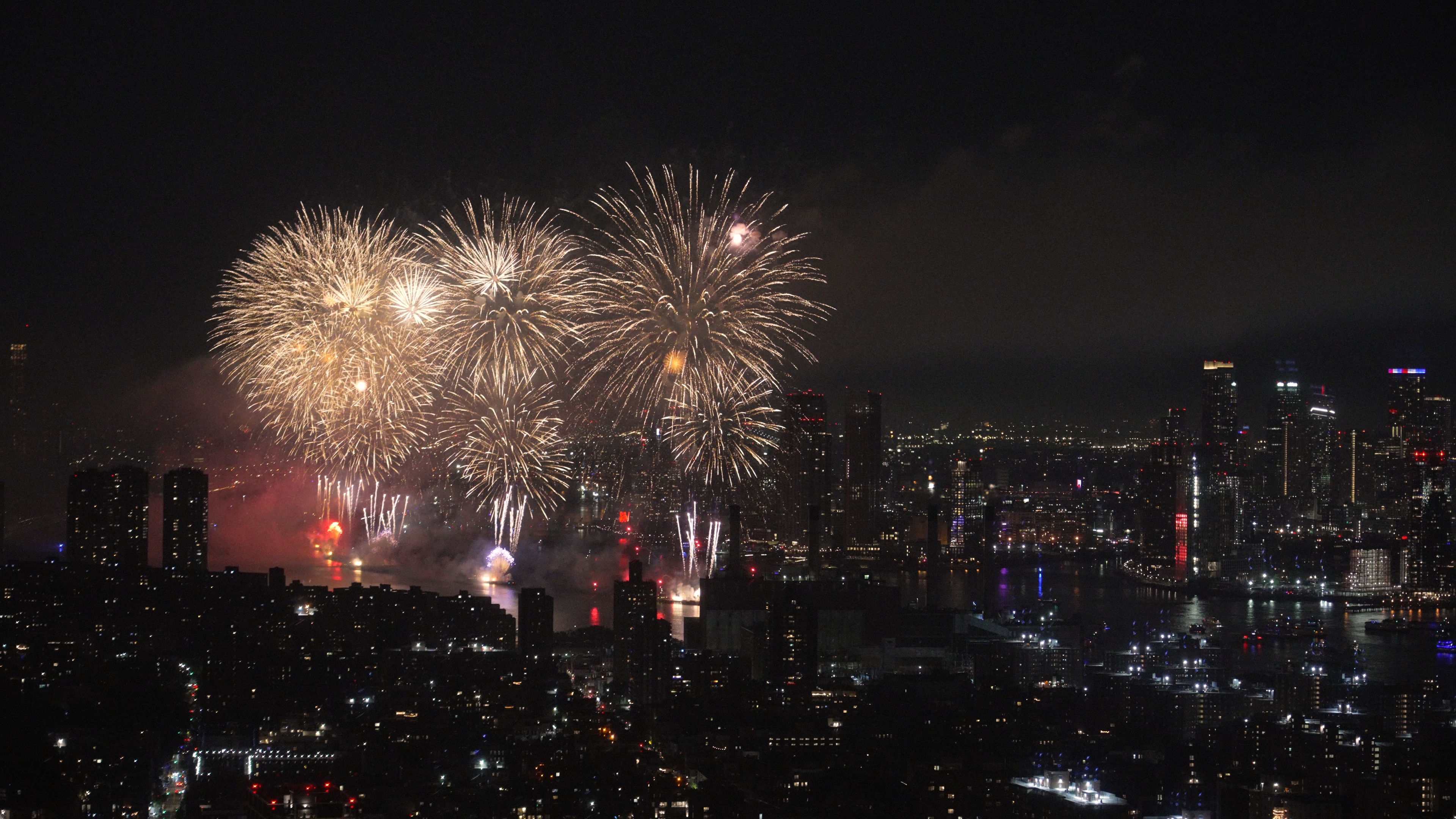 252 South Street, Unit 64G Manhattan, NY 10002 - Photo 10 of 24 a view of a house with lots of plants and trees