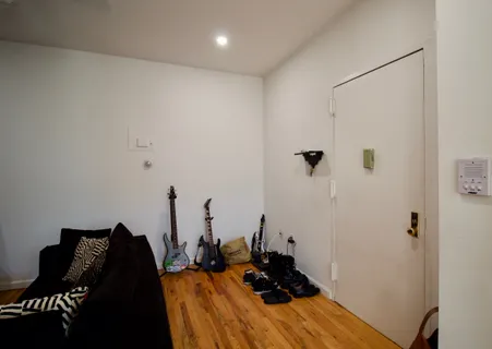 a room with furniture and gym equipment