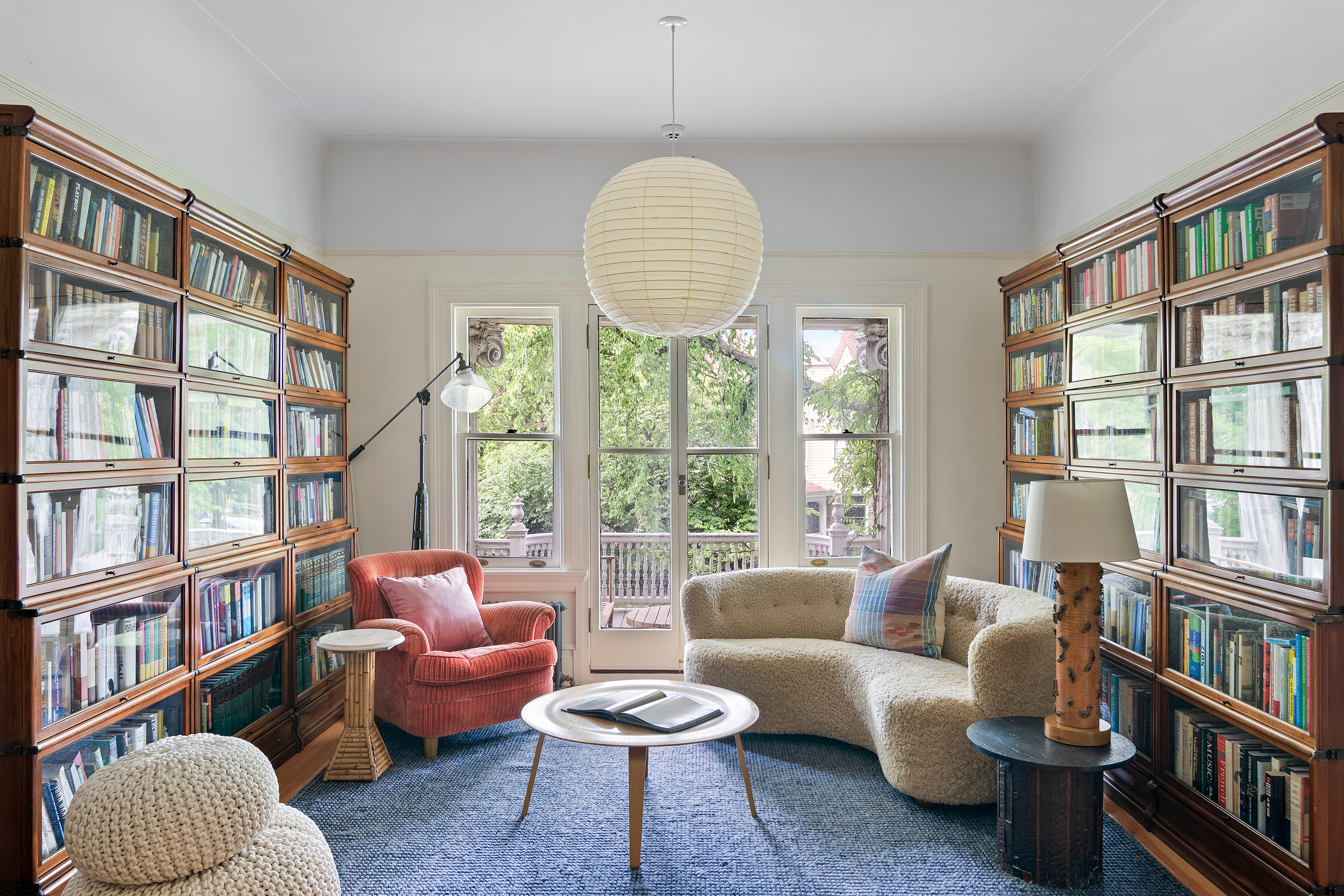 1440 Albemarle Road Brooklyn, NY 11226 - Photo 15 of 39 a living room with furniture and a book shelf