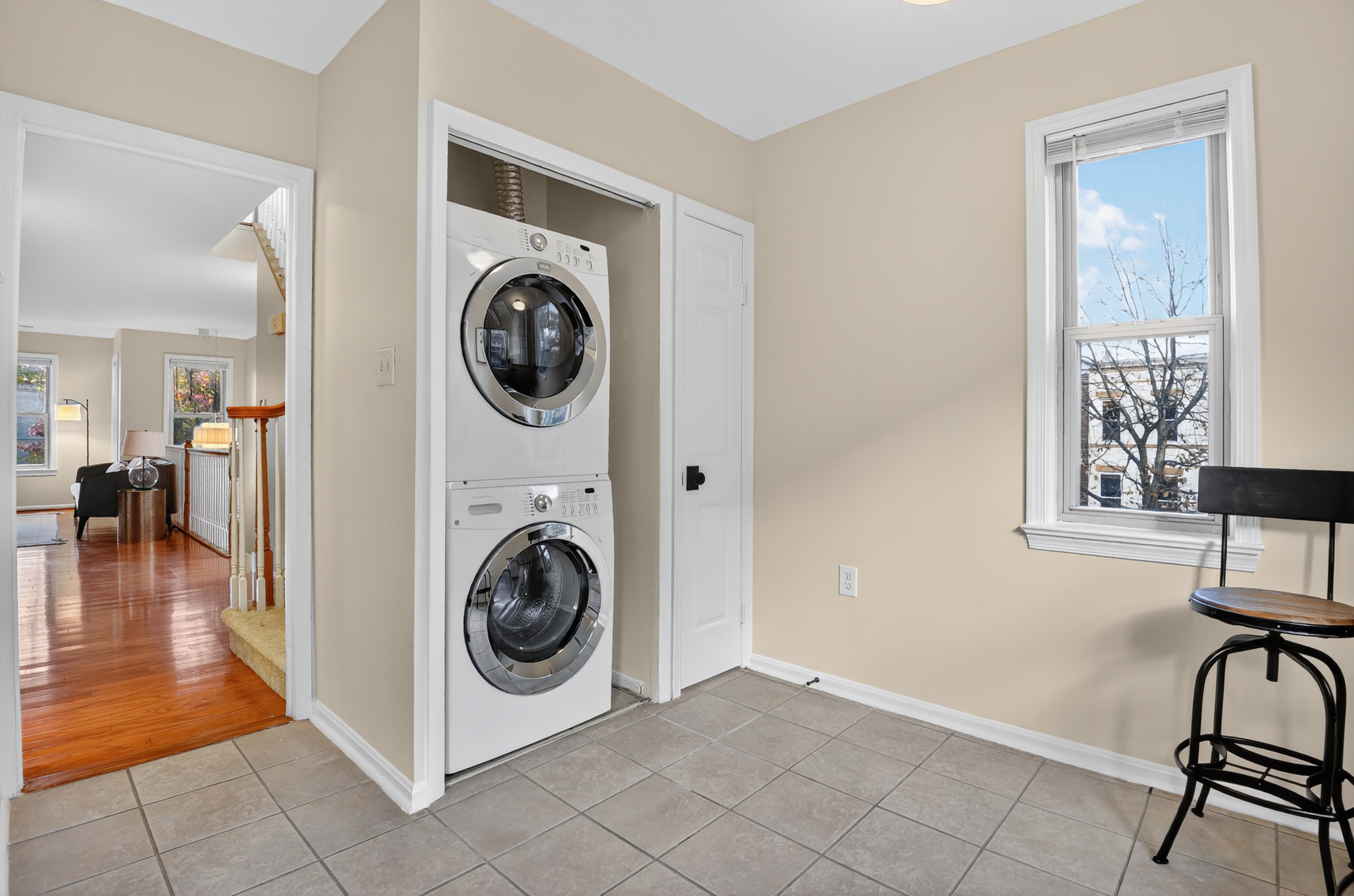 1493 15th Street Northeast, Unit 1493 Washington, DC 20002 - Photo 14 of 26 a view of a livingroom with washer and dryer