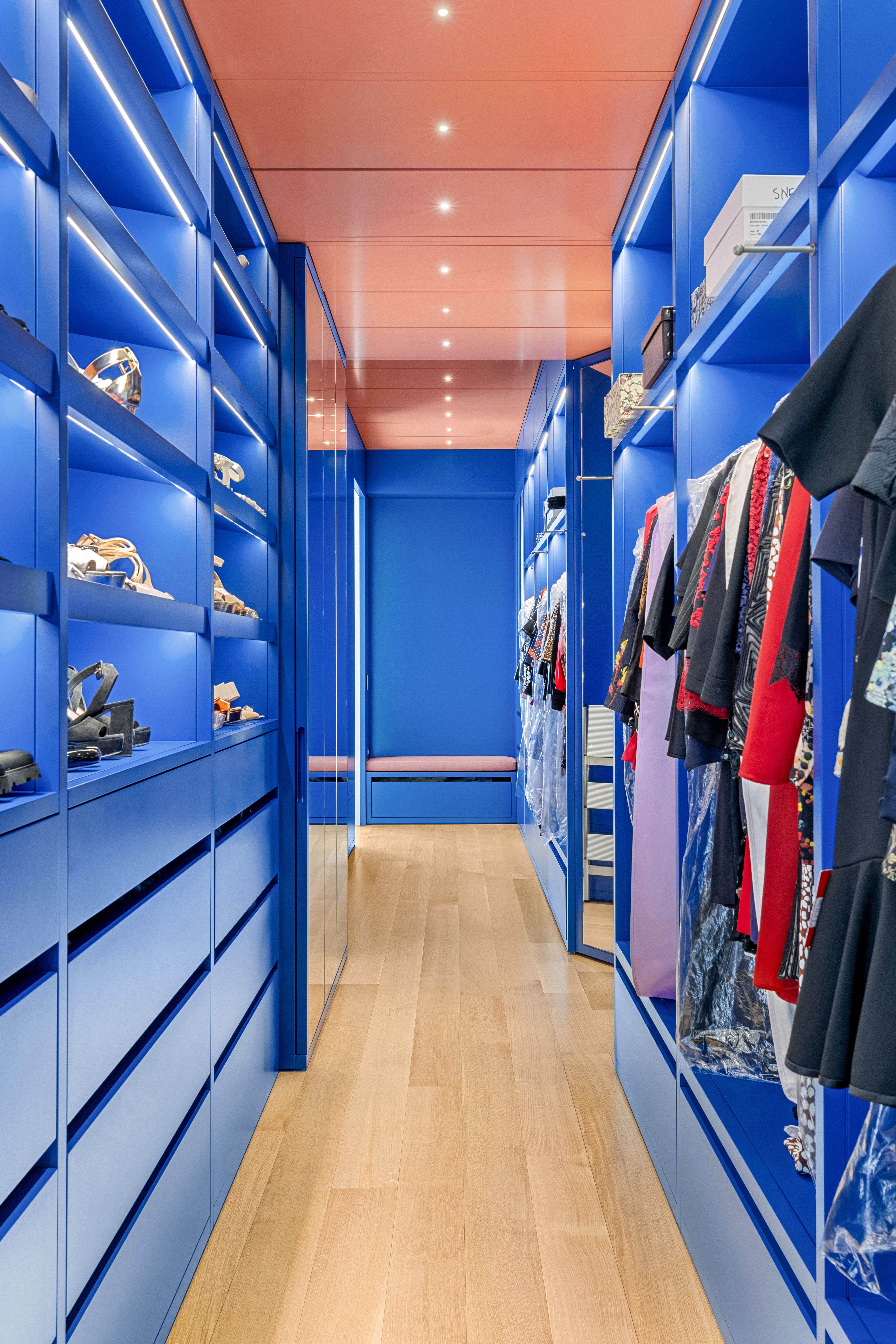 27 Wooster Street, Unit PH Manhattan, NY 10013 - Photo 22 of 34 a view of walk in closet with clothes and shoes